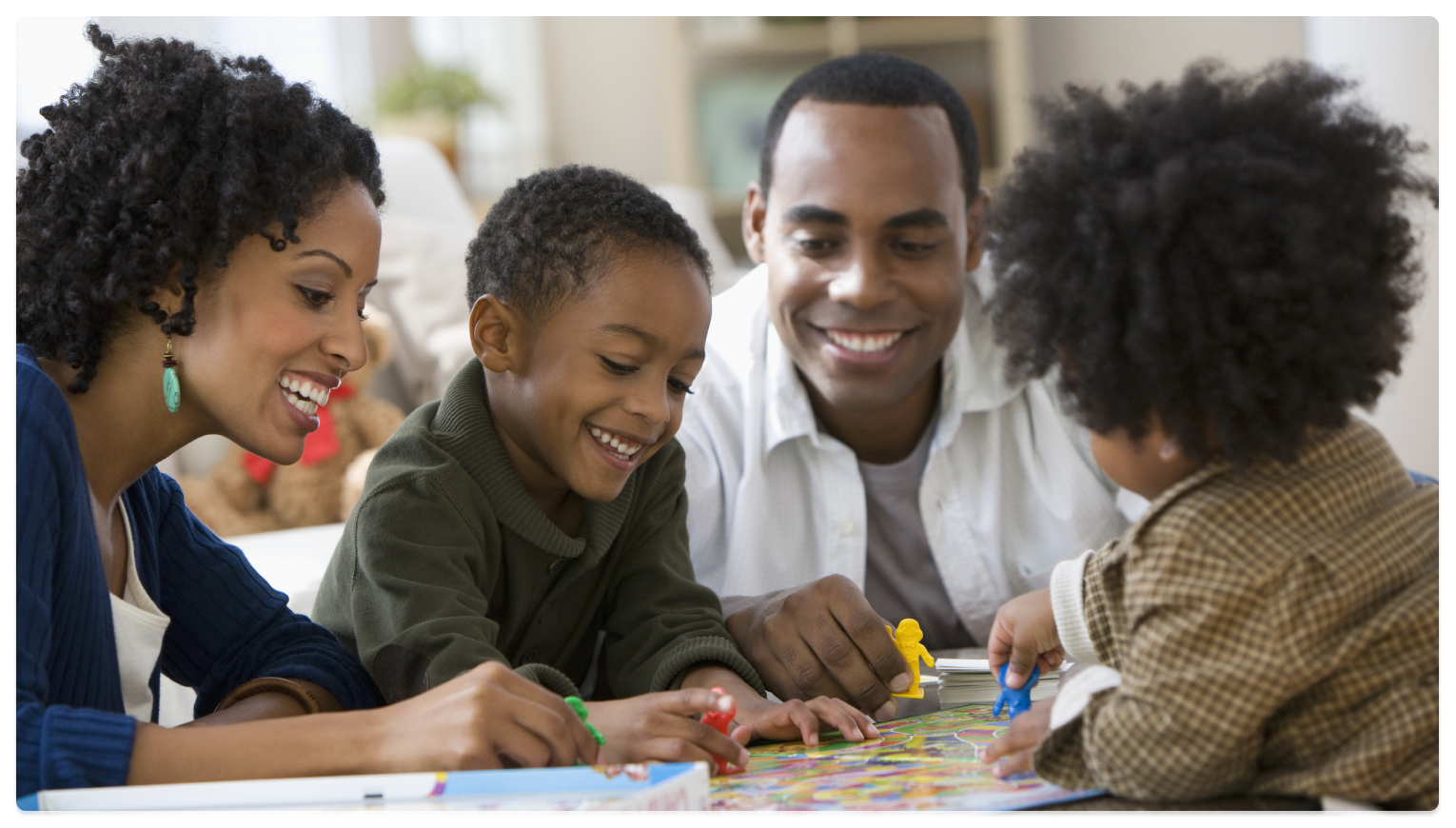 image of family playing a boardgame